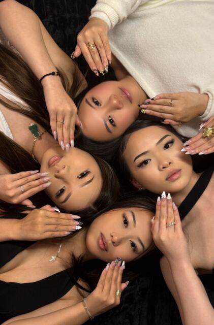 Friends lying in a circle
