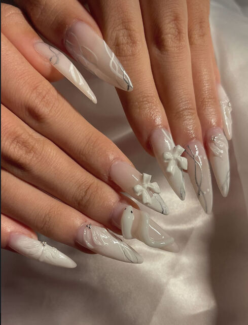 Long stiletto Gel X set with 3D bows